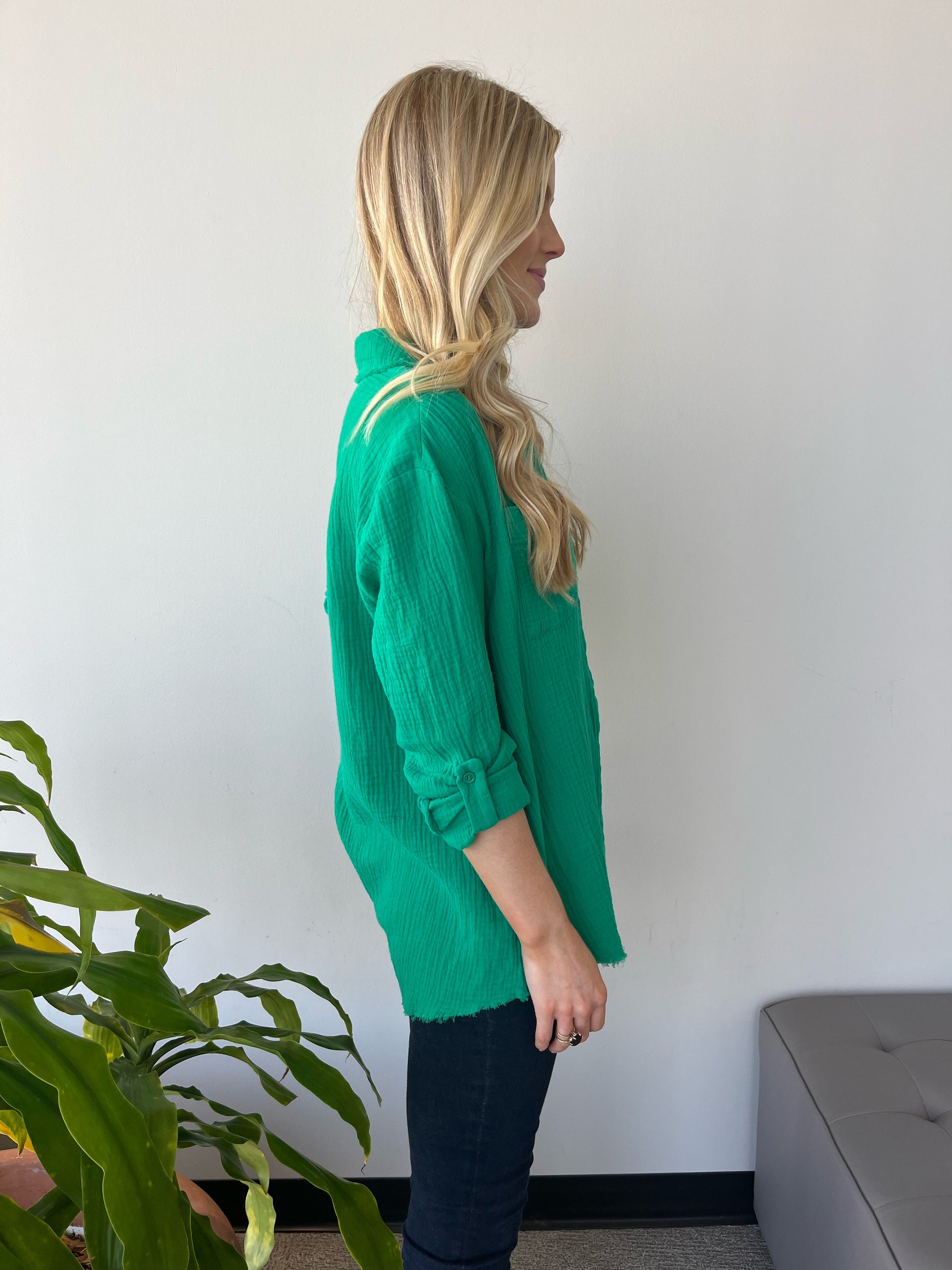 Versatile Oversized Green Gauze Shirt: Button front, adjustable sleeves. Perfect for leggings and sneakers or as a beach cover-up. Very oversized fit for relaxed style. Lightweight and comfortable for all-day wear.